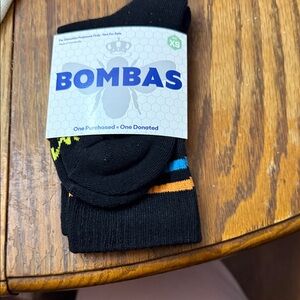 Bombas Men's Black Socks with Orange and Blue Accents